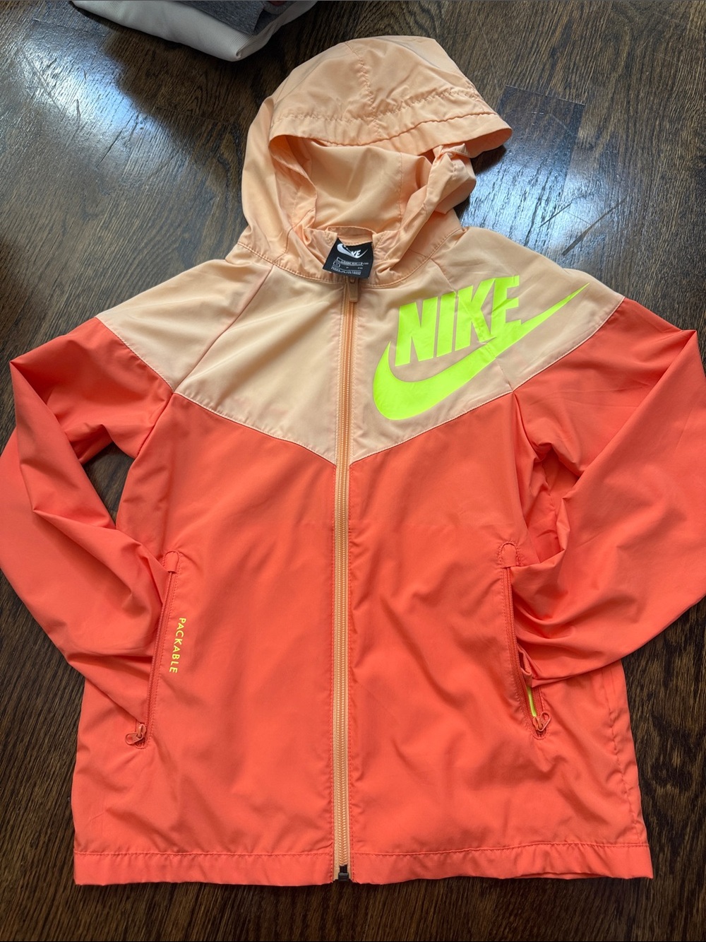 Nike Kids Peach and Coral Hooded Packable Jacket with Neon Yellow Logo